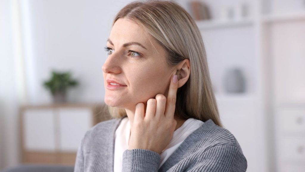 Hearing aids young woman