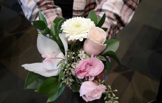 Alison Van Andel (photo of hands with flowers as per signed consent form)